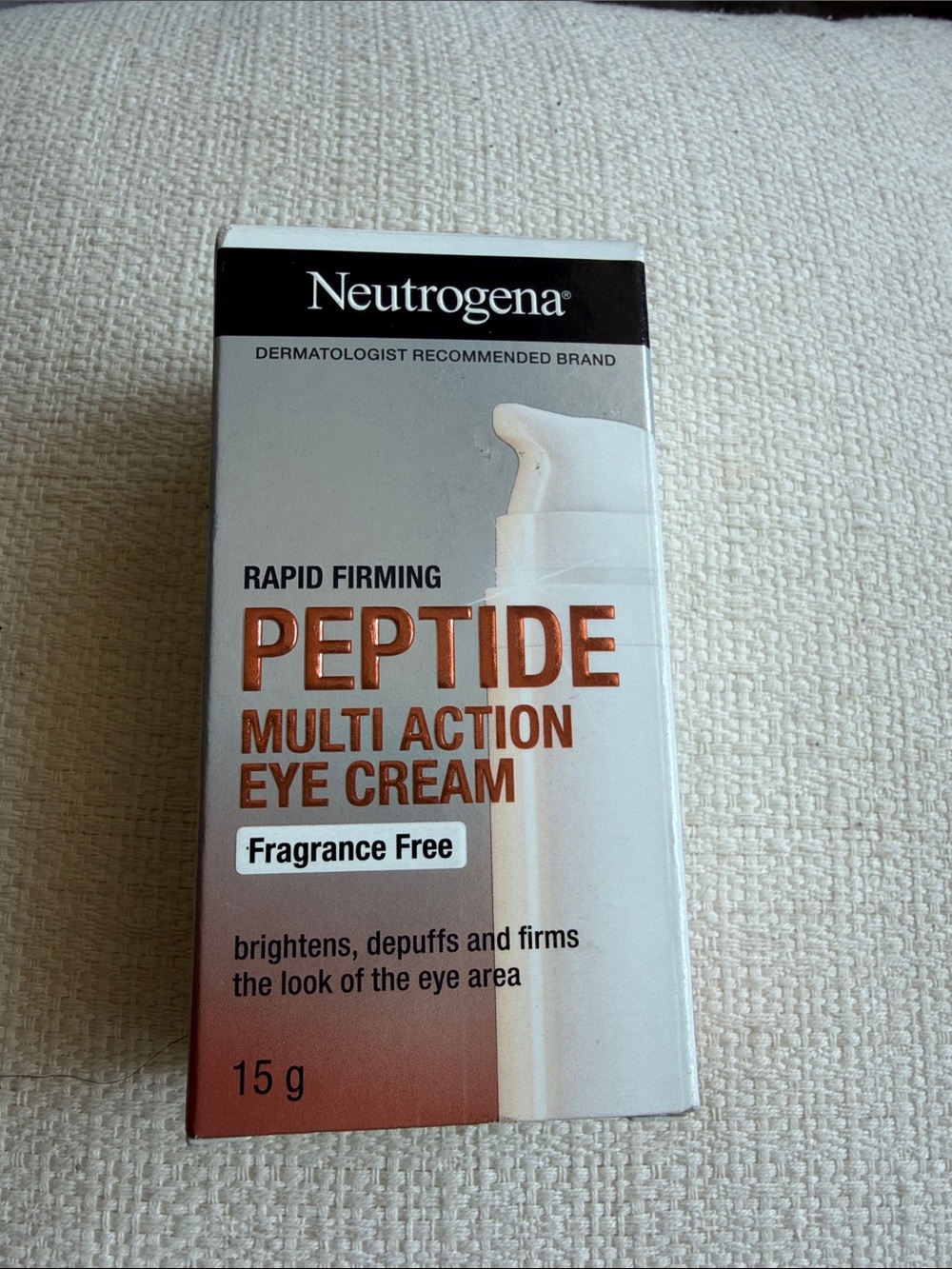 Neutrogena Peptide Multi Action Eye Cream in Copper and White